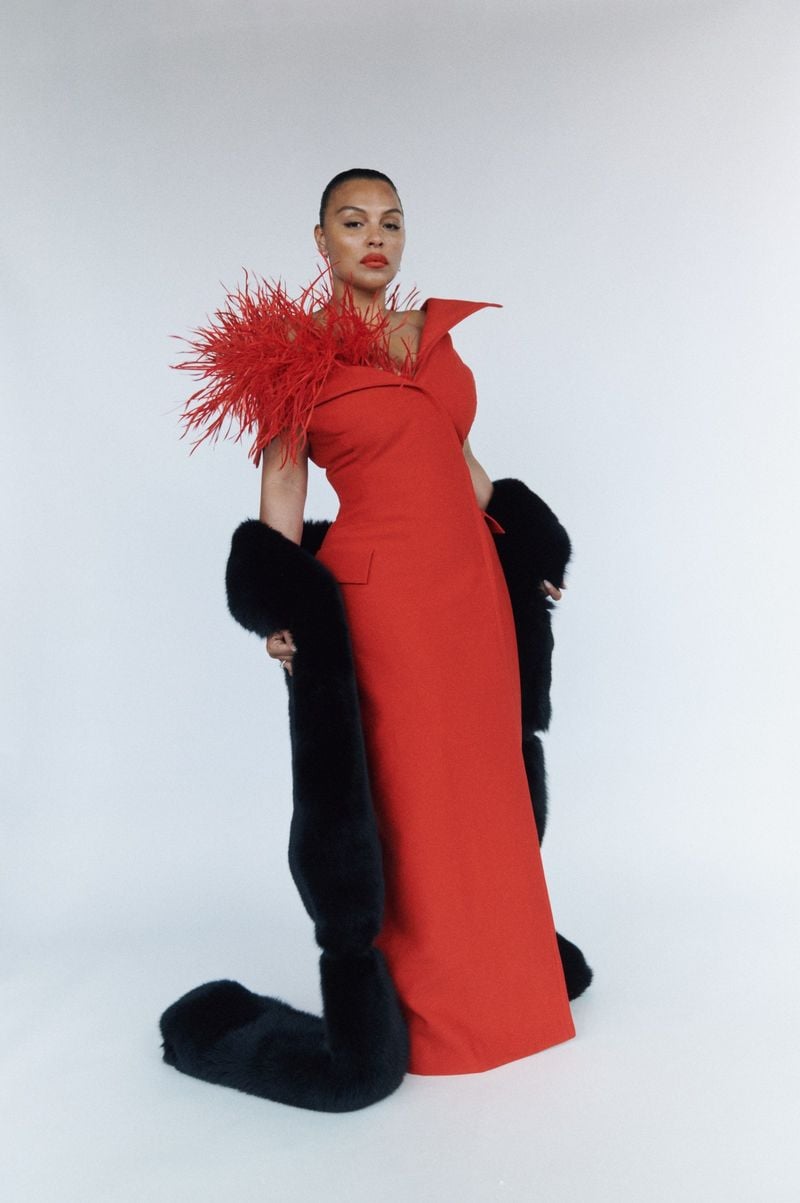 Image may contain Clothing Dress Face Head Person Photography Portrait Adult Costume Evening Dress and Formal Wear